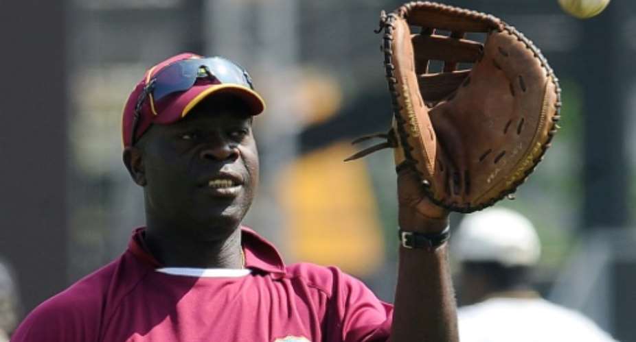 Former West Indies coach and current England bowling coach Ottis Gibson (pictured) has been tipped to succeed Russell Domingo for South Africa job.  By LAKRUWAN WANNIARACHCHI (AFP/File)