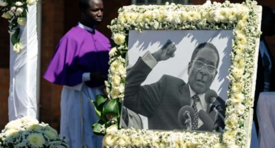 Former Zimbabwe president Robert Mugabe was finally buried in a Christian ceremony this weekend.  By Jekesai NJIKIZANA AFP