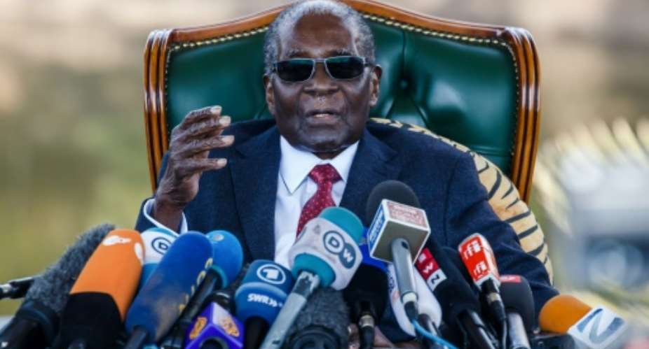 Former Zimbabwean President Robert Mugabe addresses media on July 29 during a surprise press conference at his residence Blue Roof  in Harare.  By Jekesai NJIKIZANA AFP