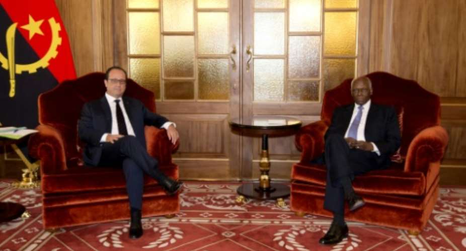 President Francois Hollande meets with his Angolan counterpart Jose Eduardo Dos Santos at the Presidential Palace in Luanda on July 3, 2015.  By Alain Jocard AFP
