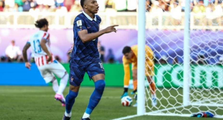 France captain Kylian Mbappe celebrates after scoring the penalty in a 1-0 victory over Paraguay to seal Les Bleus quarter-final berth.  By CHARLY TRIBALLEAU (AFP)