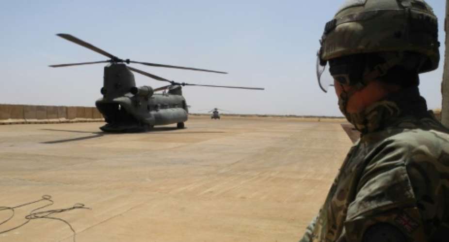 France has praised the RAF Chinooks for their ability to fly troops and equipment to frontline positions, avoiding Mali's perilous roads.  By Daphn BENOIT AFP