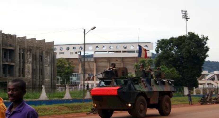 French soldiers pictured on patrol in Bangui on October 23, 2013, are to receive reinforcements under a new agreement between France and the Central African Republic.  By Pacome Pabandji AFPFile