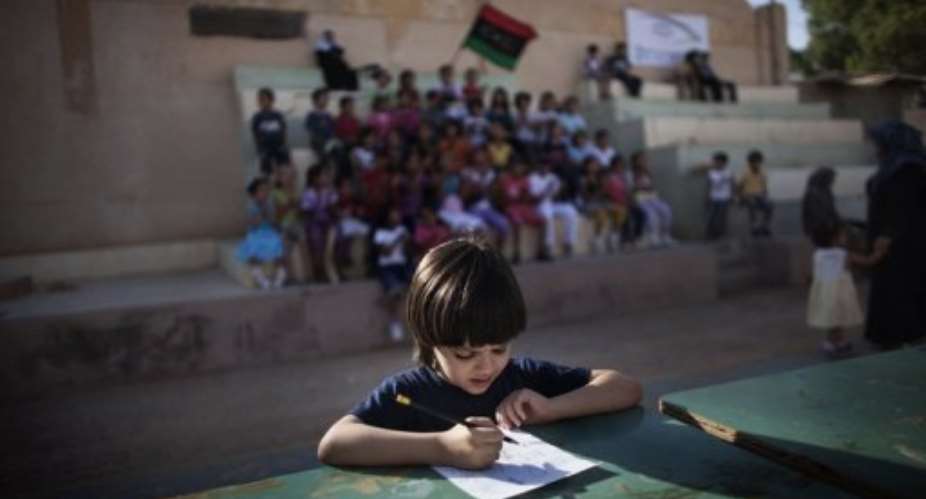 Libyan dictator Moamer Kadhafi was deeply suspicious of the Berber people.  By Marco Longari (AFP/File)