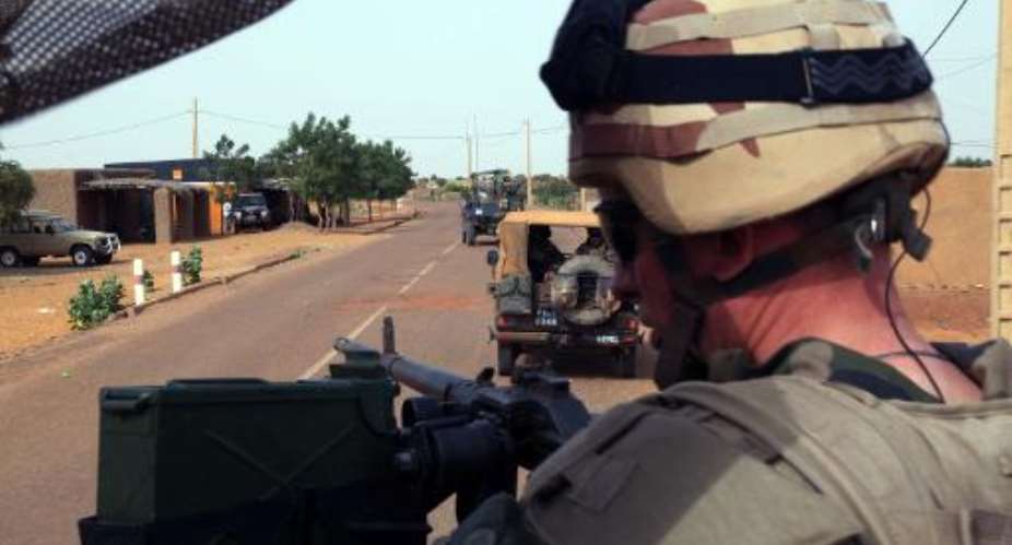 Troops of the French-led Serval Operation in Mali patrol an area on the outskirts of Gao Mali commander of west African jihadist group Al-Murabitoun.  By Sebastien Rieussec AFPFile