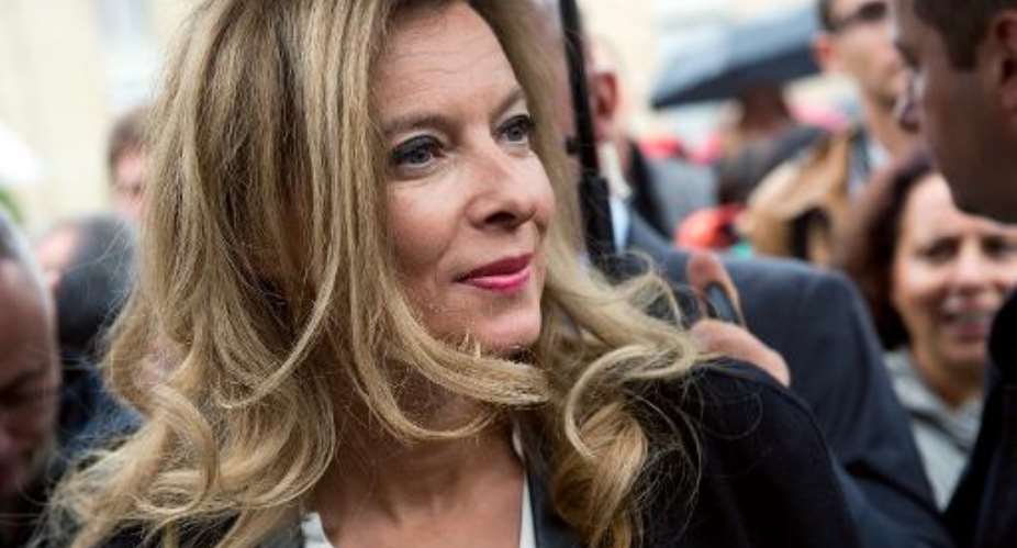 Frances First Lady Valerie Trierweiler greets visitors outside the Elysee presidential palace in Paris on September 14, 2013.  By Lionel Bonaventure (AFP/File)
