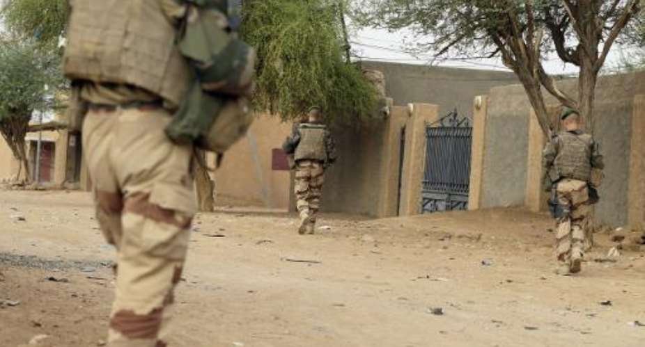 French soldiers patrol the streets on July 28, 2013 in Kidal, northern Mali.  By Kenzo Tribouillard AFPFile