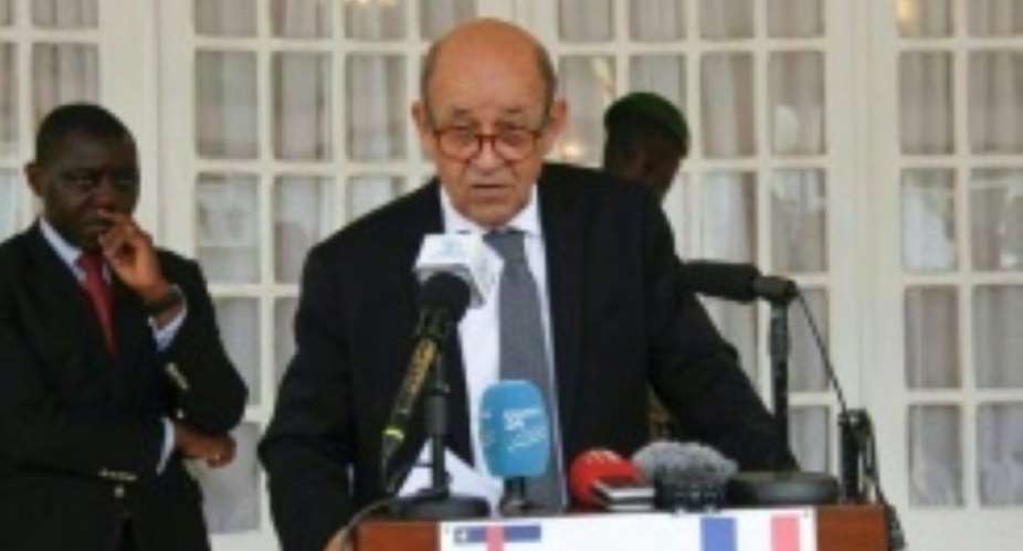 French Foreign Minister Jean-Yves le Drian announces aid and weapons for the Central African Republic.  By  AFP