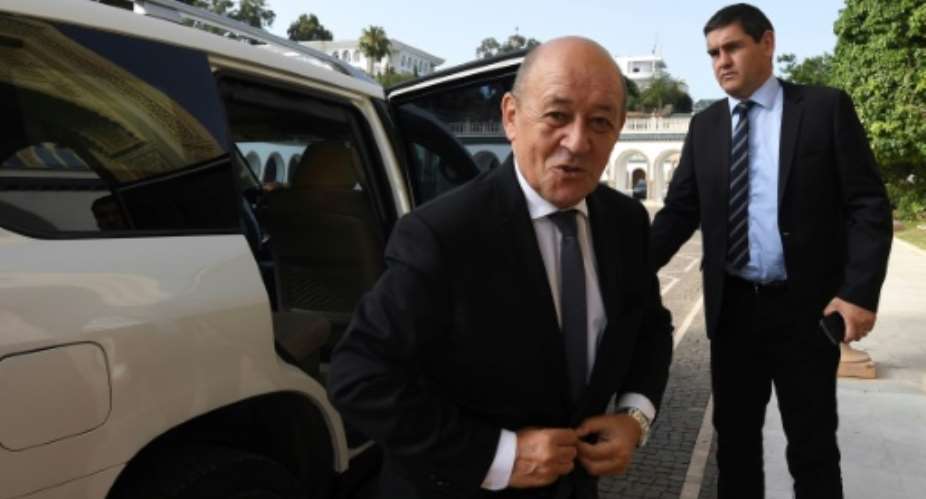 French Foreign Minister Jean-Yves Le Drian arrives to meet Tunisia's president on July 22, 2018, at the government palace in Carthage.  By FETHI BELAID AFP
