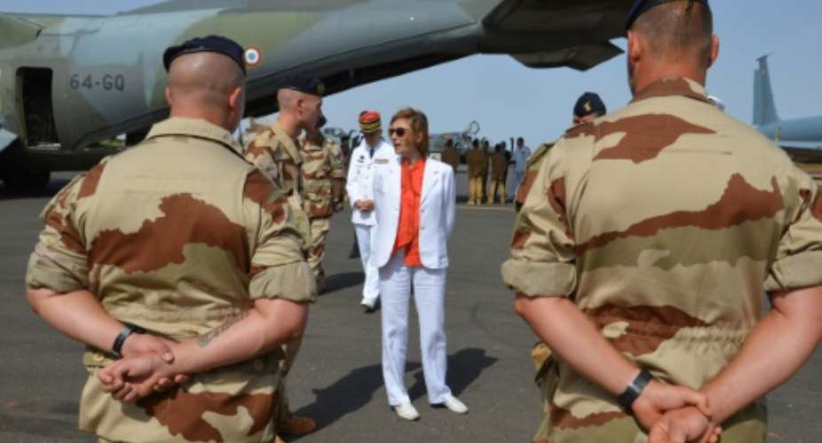 French Minister of Army Forces Florence Parly C meets French officers of the Barkhane  counter-terrorism operation in Africa's Sahel region, at the Barkhane base near Niamey in Niger on July 31, 2017.  By BOUREIMA HAMA AFP