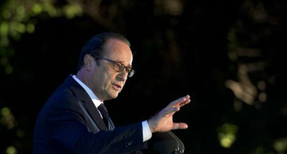 French President Francois Hollande dellivers a speech on November 29, 2014, in Dakar, on the steps of the Francophony summit.  By Alain Jocard AFP