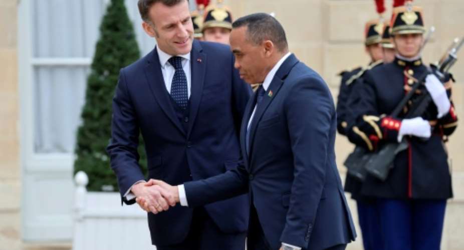 French President Emmanuel Macron and Madagascar leader Michael Randrianirina met in February.  By Ludovic MARIN (AFP/File)
