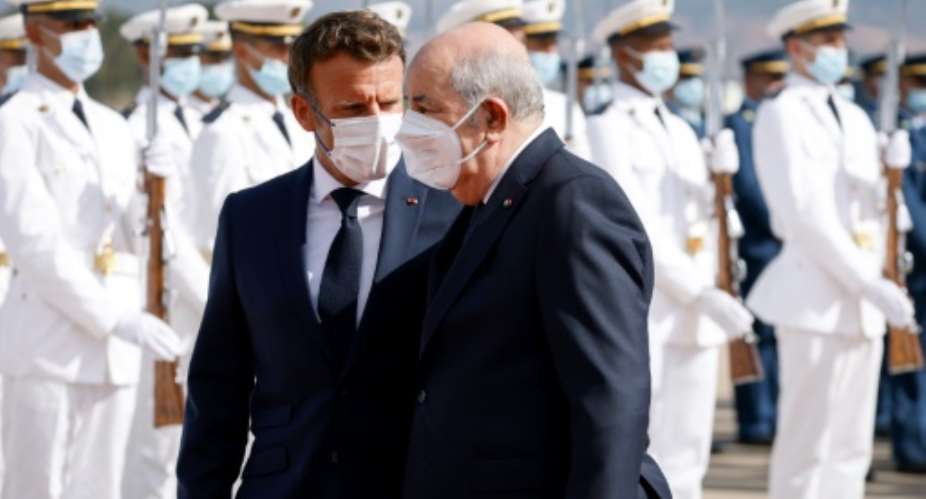 French President Emmanuel Macron is welcomed by his Algerian counterpart Abdelmadjid Tebboune as he arrives for a three-day visit aimed at mending ties.  By Ludovic MARIN AFP