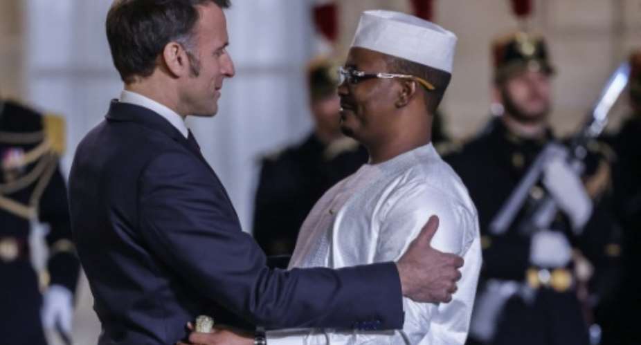 French President Emmanuel Macron (L) and Chadian President Mahamat Idriss Deby Itno agreed plans for a revitalised partnership after a year of tensions.  By Ludovic MARIN (AFP/File)