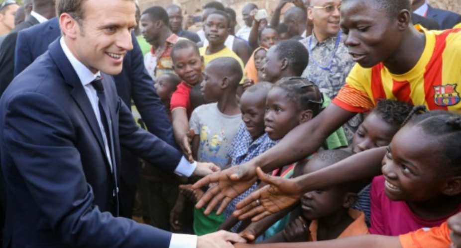 French President Emmanuel Macron on a visit toBurkina Faso capital Ouagadougou in 2017.  By ludovic MARIN (AFP)