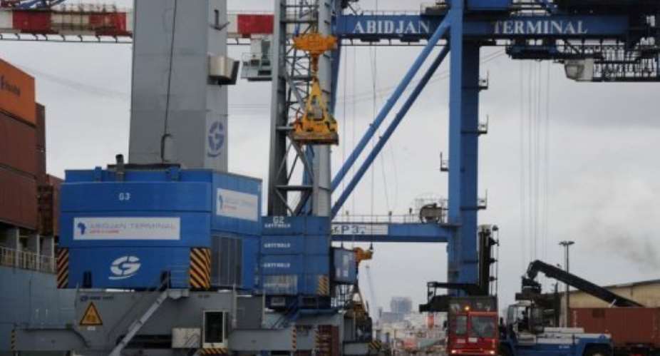 Cranes pictured on the docks at the port in Ivory Coasts capital Abidjan on October 4, 2012.  By Sia Kambou (AFP/File)