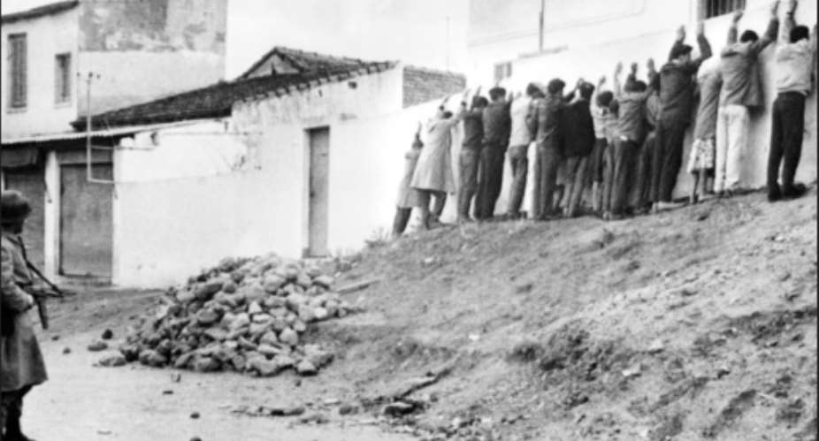 French troops line Algerians up against a wall in Algiers in December, 1960.  By STF AFPFile