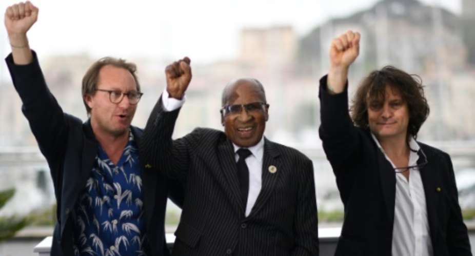 From L French director Nicolas Champeaux, South African anti-apartheid campaigner and former political prisoner Andrew Mlangeni and French co-director and screenwriter Gilles Porte present at Cannes  The State Against Mandela, a documentary about the historical Rivonia trial in the 1960s.  By Loic VENANCE AFP