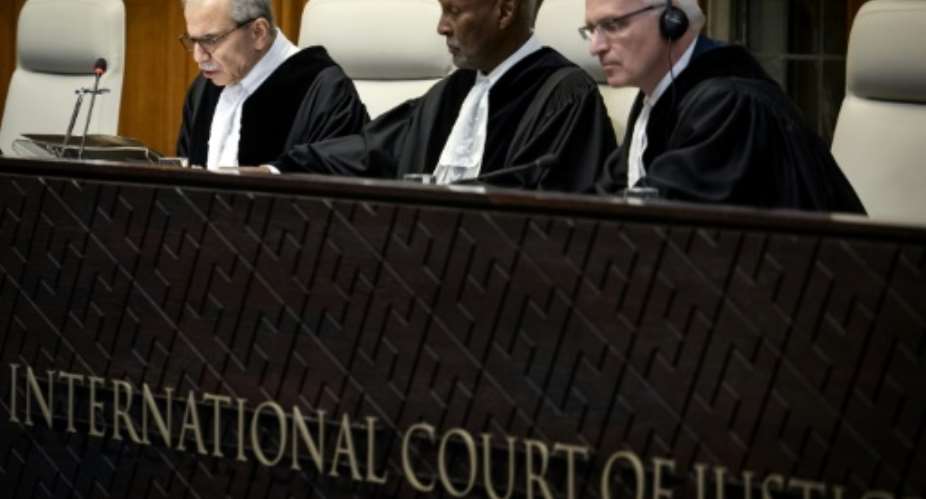 (From L) Judge Nawaf Salam, Judge Abdulqawi Ahmed Yusuf and Judge Georg Nolte attend a hearing at the International Court of Justice as part of South Africas request on a Gaza ceasefire in The Hague in May 2024.  By Koen van Weel (ANP/AFP)
