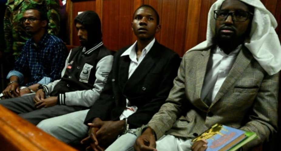 From the left, Hassan Aden Hassan, Mohamed Ali Abikar and Rashid Charles Mberesero were convicted of being accomplices in the 2015 massacre. Sahal Diriye Hussein, on the right, was acquitted.  By SIMON MAINA AFP