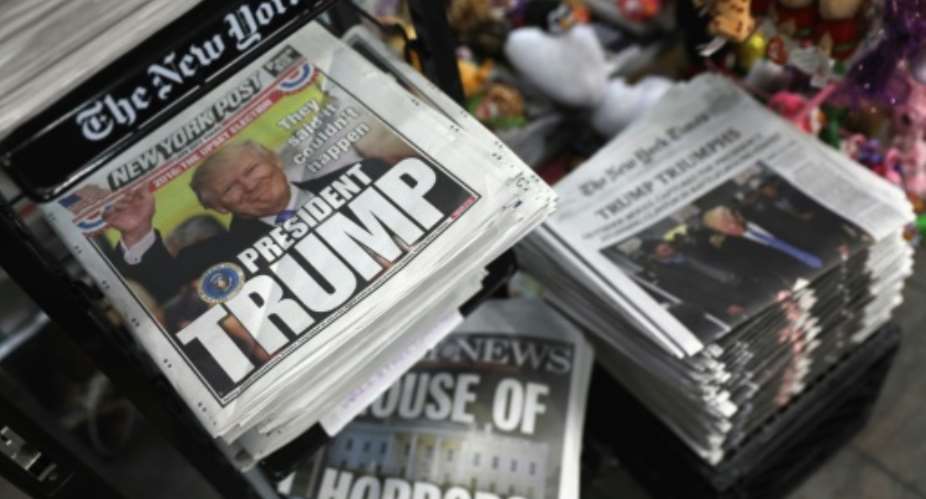 Front pages from New York City newspapers feature President-elect Donald Trump, on November 9, 2016.  By John Moore (Getty/AFP/File)