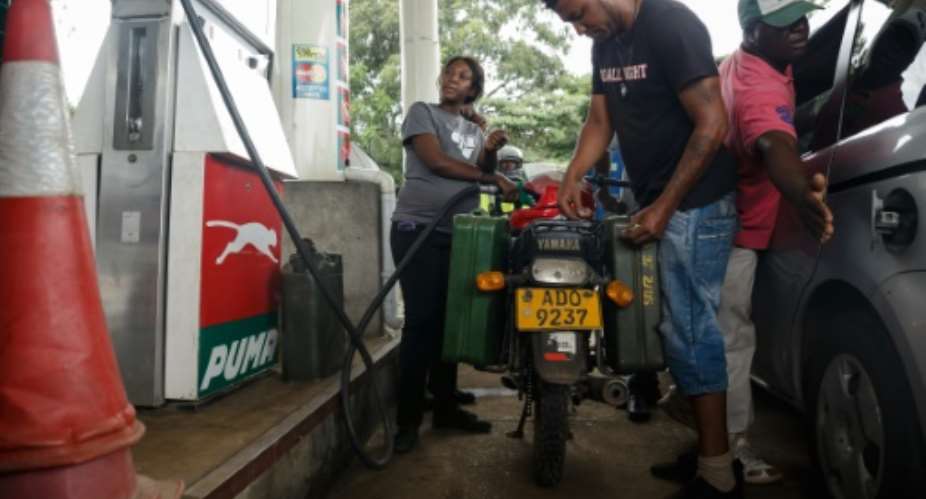 Fuel price increases are one of the other measures the government has introduced to deal with the crisis.  By Jekesai NJIKIZANA AFP