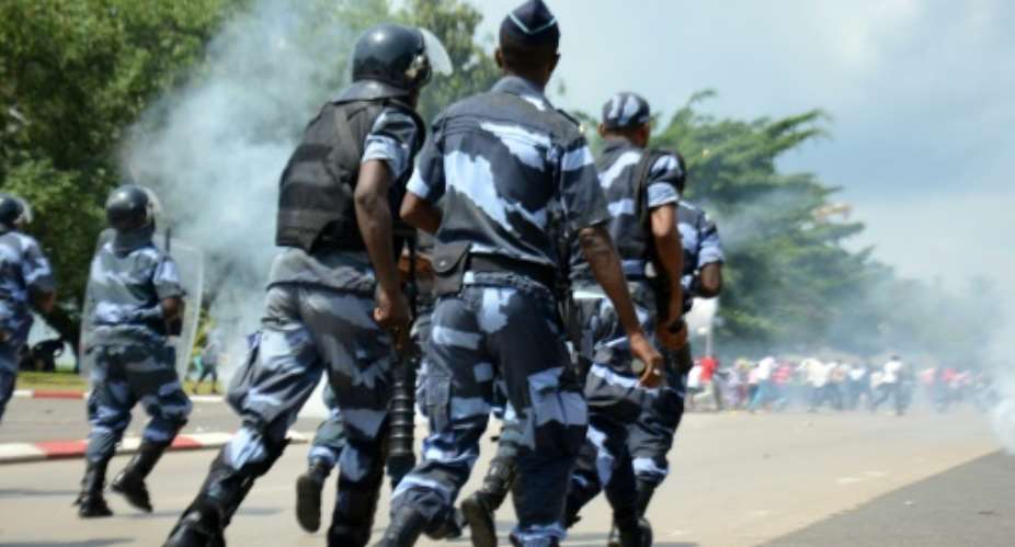Defying a heavy police presence, hundreds of protesters took to the streets in opposition to President Ali Bongo Ondimba's candidacy for re-election on August 26.  By Jean-Rovys Dabany AFPFile