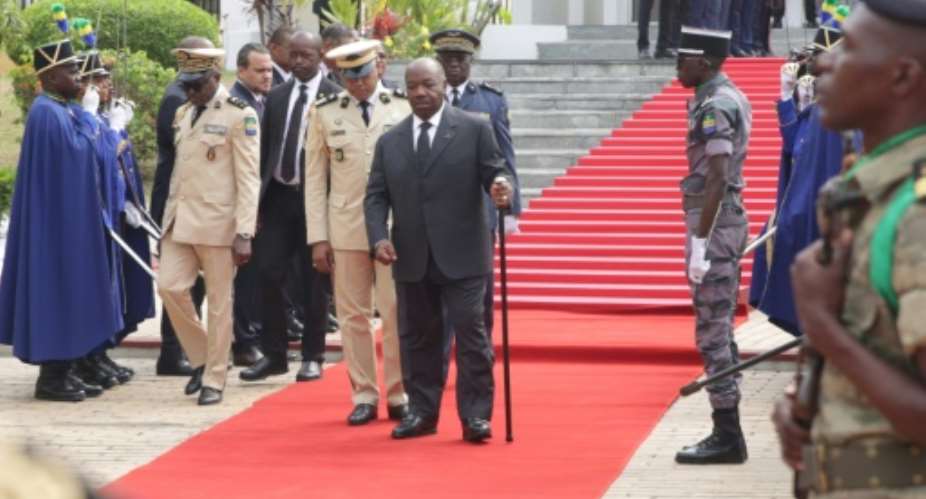 Gabon President Ali Bongo on Friday made his first public appearance outside the presidential palace since returning home in March after suffering a stroke.  By STEVE JORDAN AFPFile