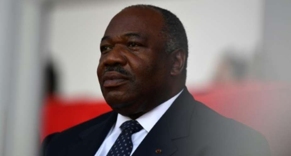 Gabonese President Ali Bongo, pictured here on February 5, 2017, is recovering after falling ill last month.  By GABRIEL BOUYS AFPFile