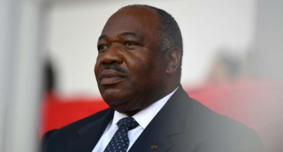 Gabon's ailing President Ali Bongo left Morocco on Monday to fly home days after security forces there foiled an attempted coup.  By GABRIEL BOUYS AFPFile