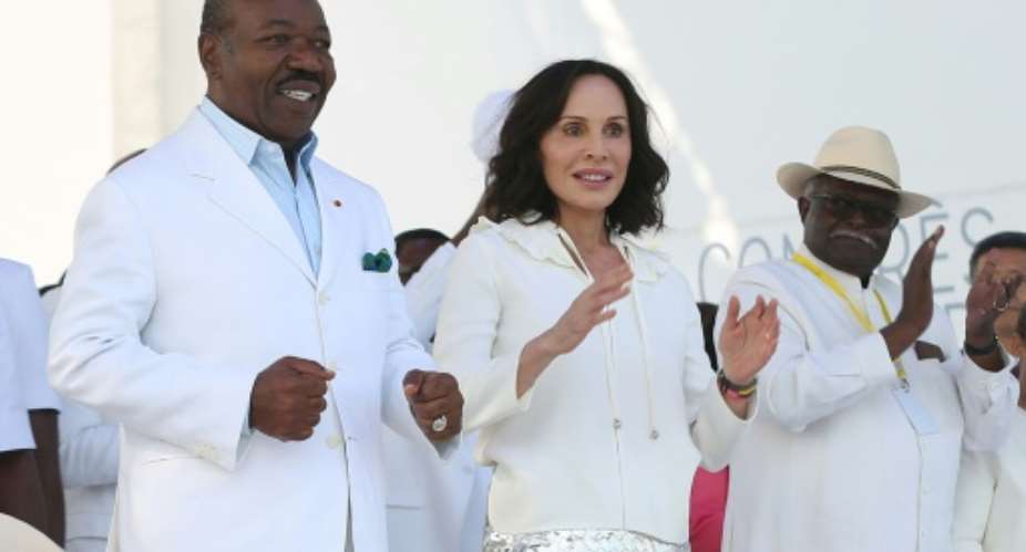 Gabon's ousted president Ali Bongo Ondimba L and his wife Sylvia Bongo Ondimba Valentin, 60, who has been provisionally jailed, her lawyer says.  By Steeve JORDAN AFPFile
