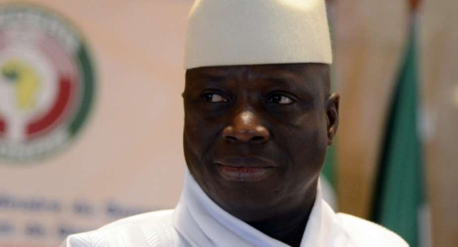 Gambia's President Yahya Jammeh, pictured on March 28, 2014, warns that death row inmates should expect to have their sentences implemented, apparently signalling an end to a three-year unofficial moratorium on executions.  By Issouf Sanogo AFPFile