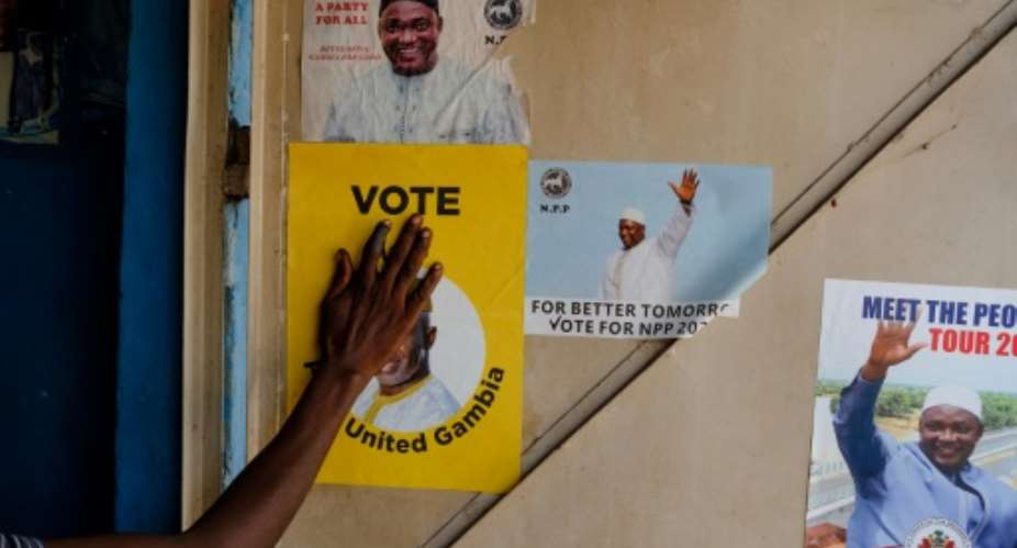 Gambians head to the polls to pick a president on Saturday.  By GUY PETERSON AFP