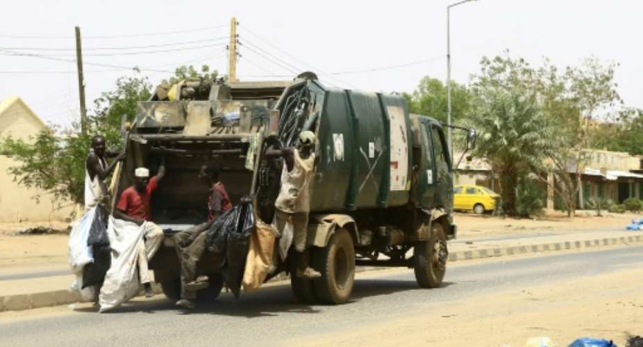 Garbage lorries and street sweepers returned to Sudan's capital on Wednesday, after a three-day civil disobedience campaign.  By - AFP