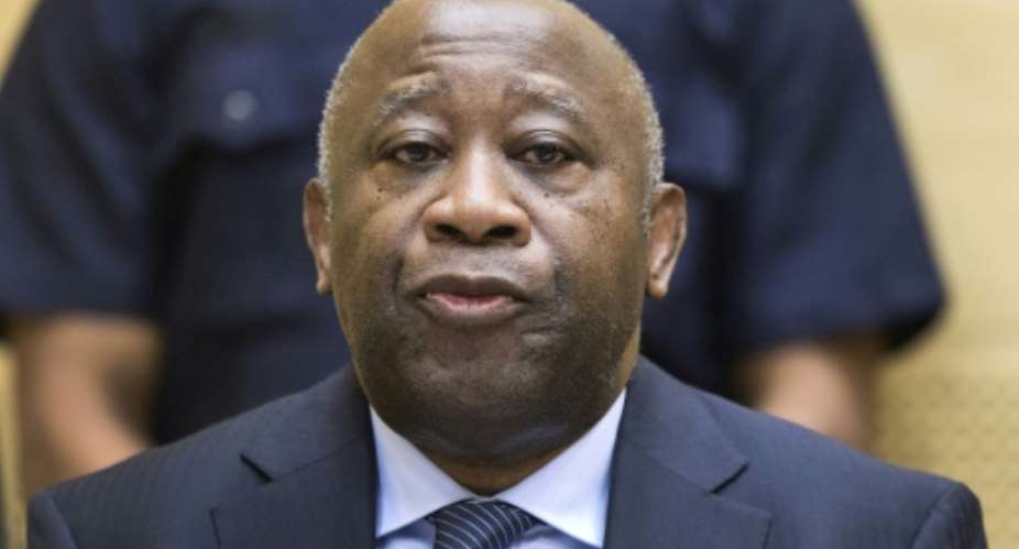 Gbagbo, pictured in February 2013 at a pre-trial hearing at the International Criminal Court in The Hague.  By MICHAEL KOOREN POOLAFPFile