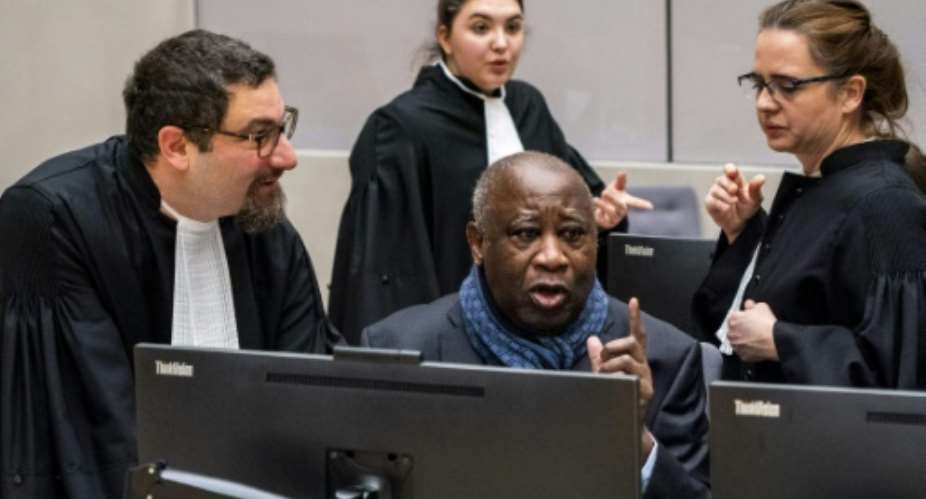 Gbagbo, shown here at the ICC in February, plans to go home if Wednesday's decision goes his way.  By Jerry LAMPEN ANPAFPFile