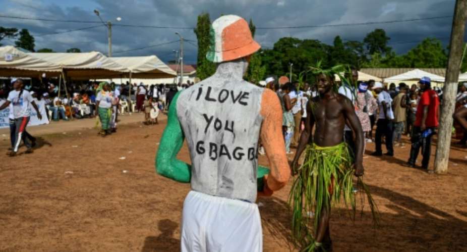 Gbagbo supporters gathered for his long-awaited return to his home village of Mama on June 27.  By SIA KAMBOU AFP