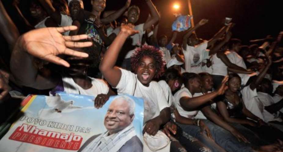 Guinea Bissau's Manuel Serifo Nhamadjo's supporters cheer during a rally in March 2012.  By Issouf Sanogo AFPFile
