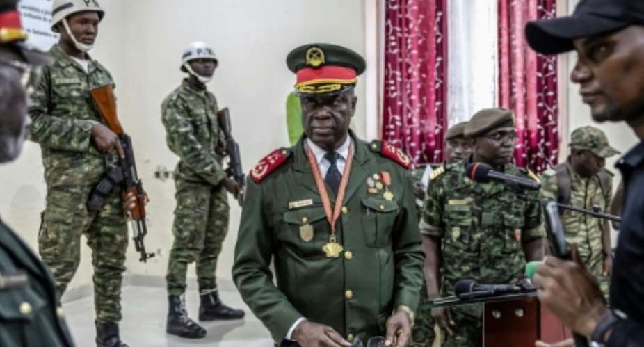 General Horta NTam (C) has been sworn in as the leader of Guinea-Bissau.  By PATRICK MEINHARDT (AFP)