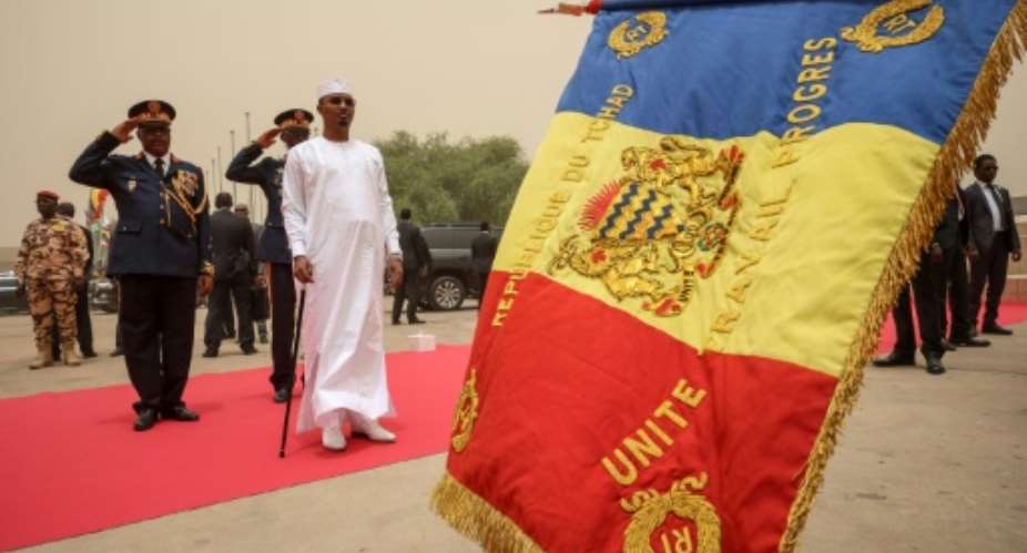 General Mahamat Idriss Deby Itno (C) was sworn in as president of Chad for a five-year term after an election contested by the opposition.  By Joris Bolomey (AFP)