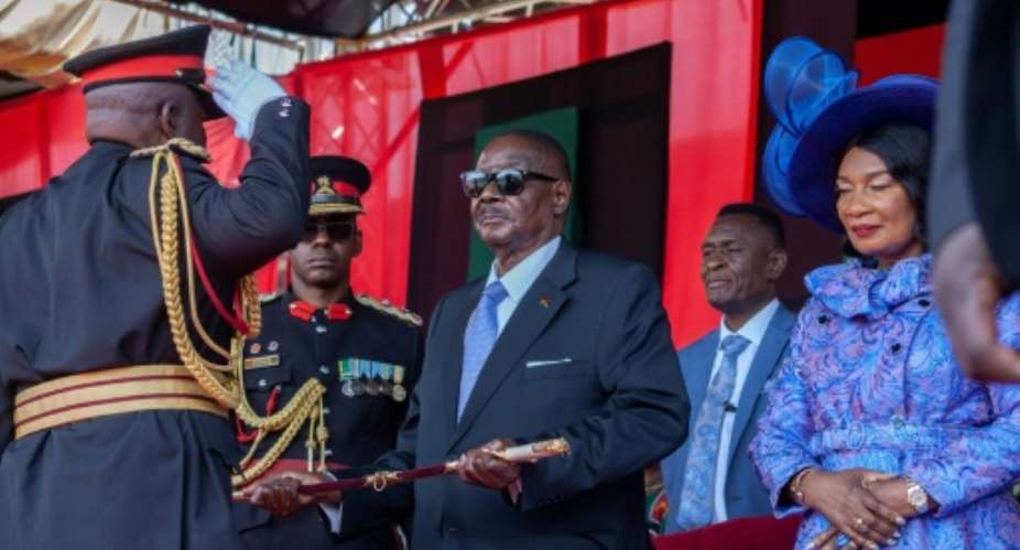General Paul Valentino Phiri (L) was head of Malawis armed forces from July 2023 until October 2025.  By Amos GUMULIRA (AFP/File)