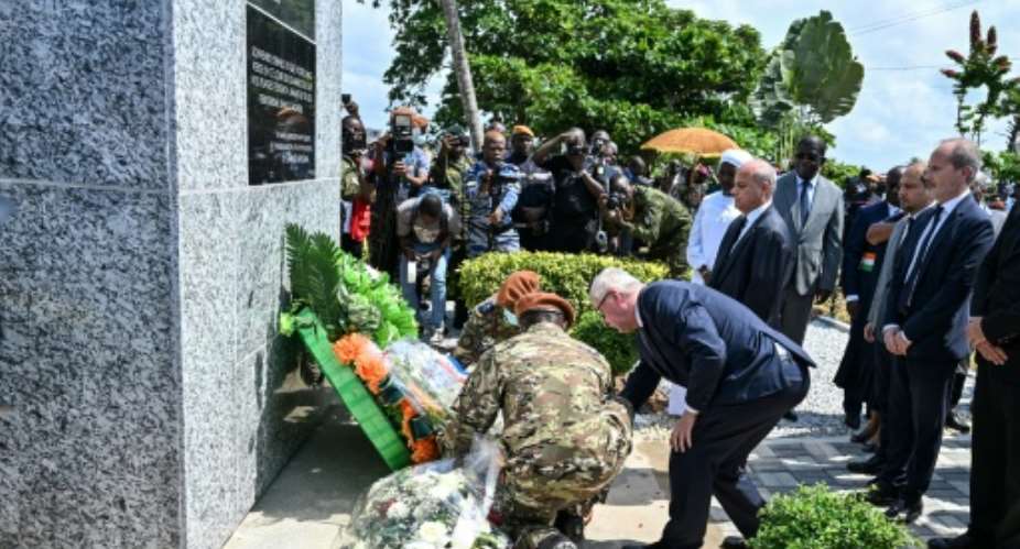German Ambassador to Ivory Coast Matthias Veltin (C) was among those at the ceremony.  By Sia KAMBOU (AFP)