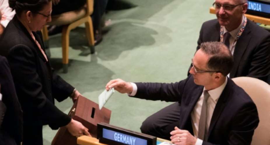 German Foreign Minister Heiko Maas votes during a General Assembly meeting to elect the five non-permanent members of the Security Council at the United Nations in New York on June 8, 2018.  By Don EMMERT AFP