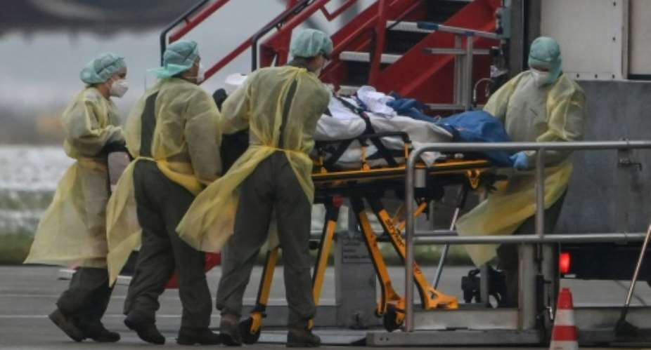 Germany used a military plane to transfer intensive care patients to less afflicted regions.  By CHRISTOF STACHE AFP