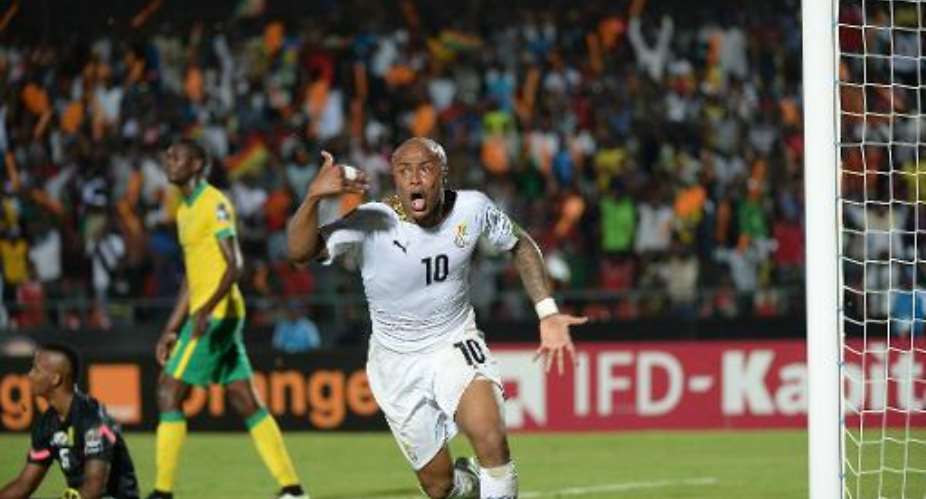 Ghana's midfielder Andre Ayew celebrates after scoring his team's winning goal during the 2015 African Cup of Nations group C football match against South Africa on January 27, 2015 in Mongomo.  By Khaled Desouki AFP