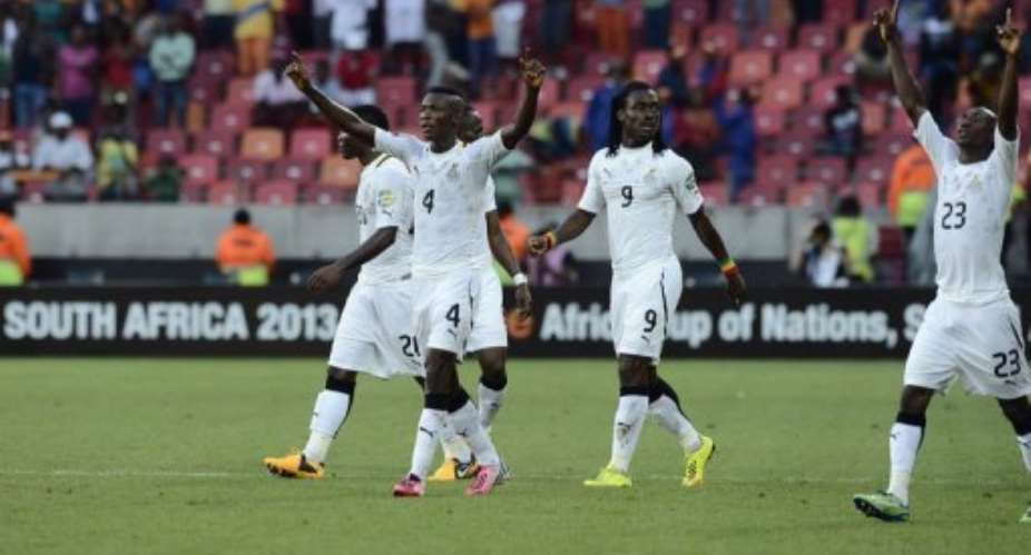 Ghana players celebrate their win in the African Cup of Nations quarter final against Cape Verde, on February 2, 2013.  By Stephane de Sakutin AFP