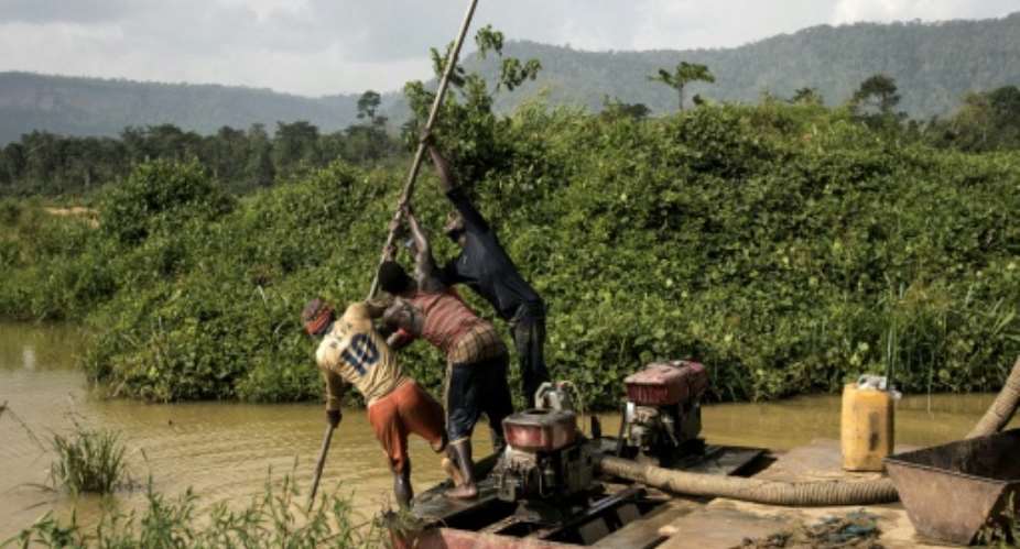 Ghana has long been home to an informal artisanal mining sector.  By CRISTINA ALDEHUELA (AFP/File)