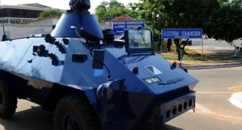 A police armoured car patrols in Accra on December 9, 2012.  By Pius Utomi Ekpei AFPFile