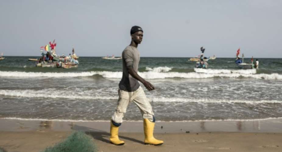 Ghana Town sprung up in the late 1950s, with Ghanaian fishermen searching for lucrative waters.  By MUHAMADOU BITTAYE (AFP)