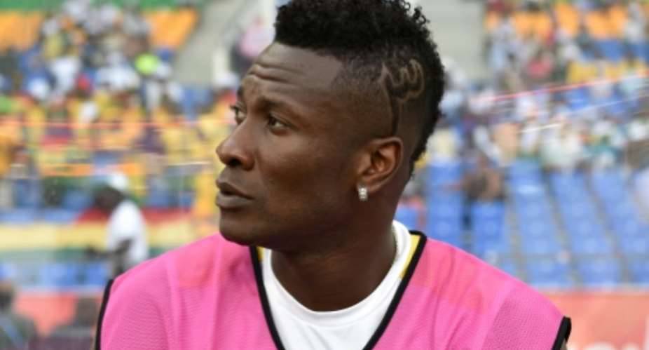 Ghana's forward Asamoah Gyan who is recovering from an injury sits on the bench during the 2017 Africa Cup of Nations quarter-final football match between DR Congo and Ghana in Oyem on January 29, 2017.  By ISSOUF SANOGO AFPFile